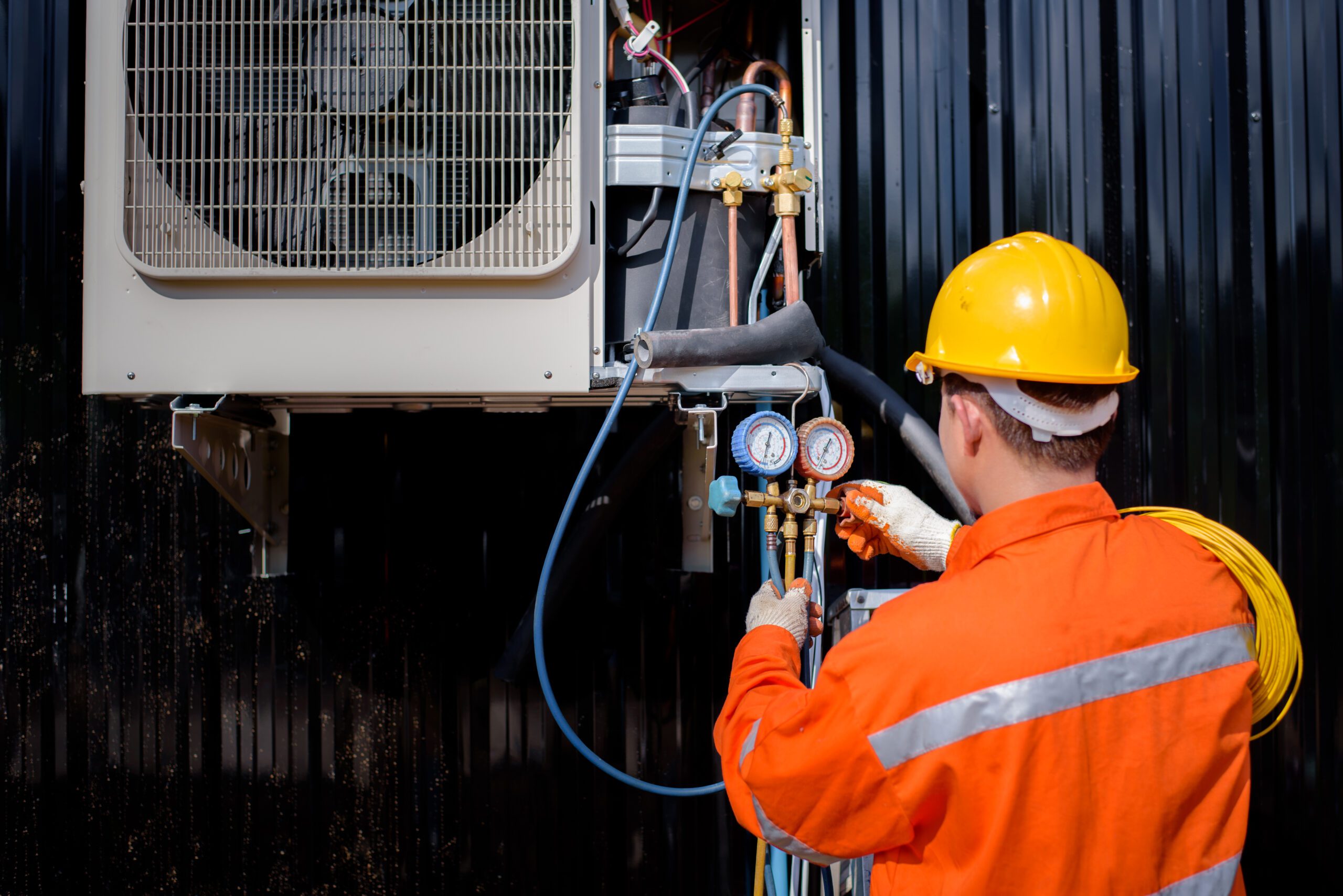 asian male electricians inspect electrical systems buildings scaled